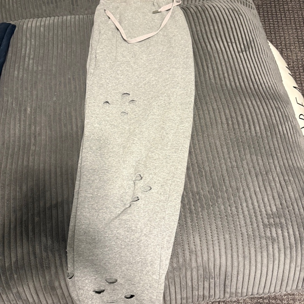 Women’s grey sweatpants with cut outs, size small